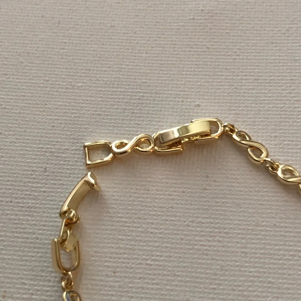 Gold Clover Link Bracelet with Pave Accents